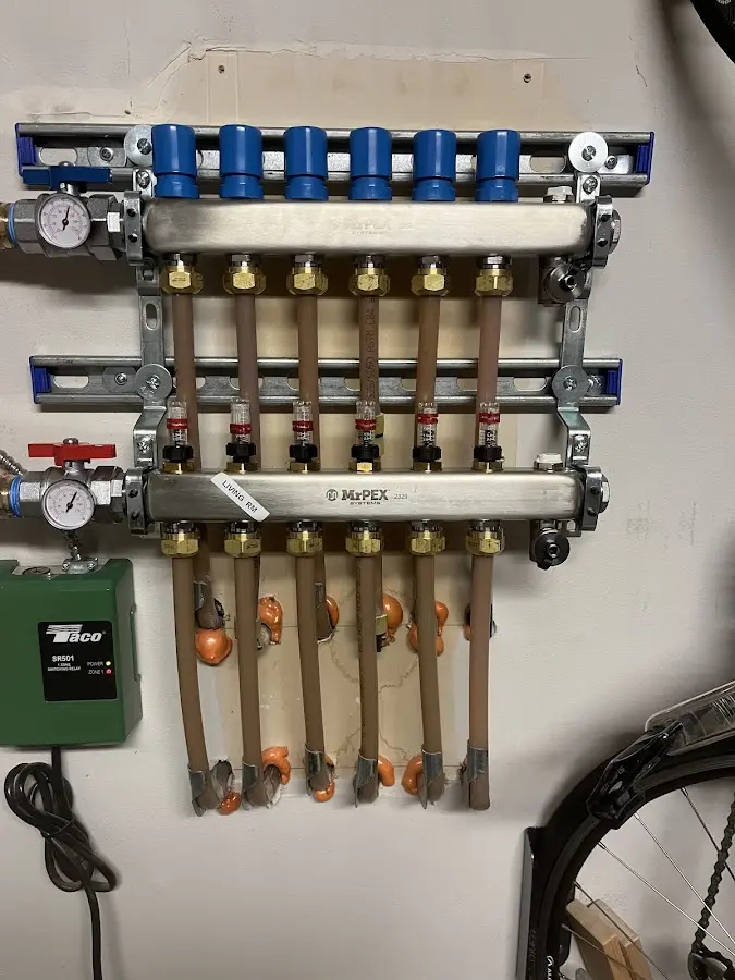 Plumber performing Water Heater Repair at a residential property in Green Hill